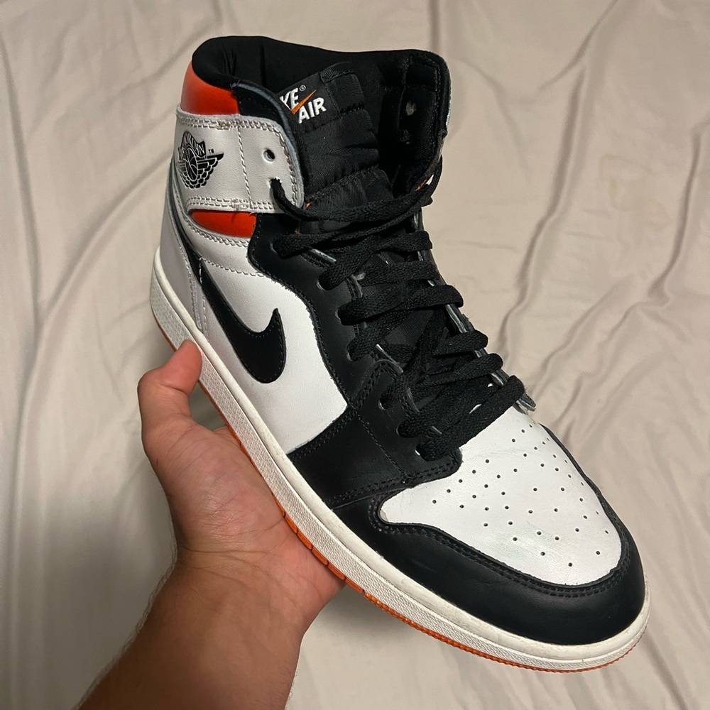 Nike Men's Black, White, and Orange Jordan 1s